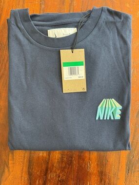 Nike Navy Short Sleeve Tee with Green & Teal Logo